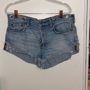 We the free faded blue denim shorts with rivets on top | 29